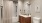 a bathroom with a tub toilet and sink