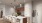 a kitchen with white cabinets