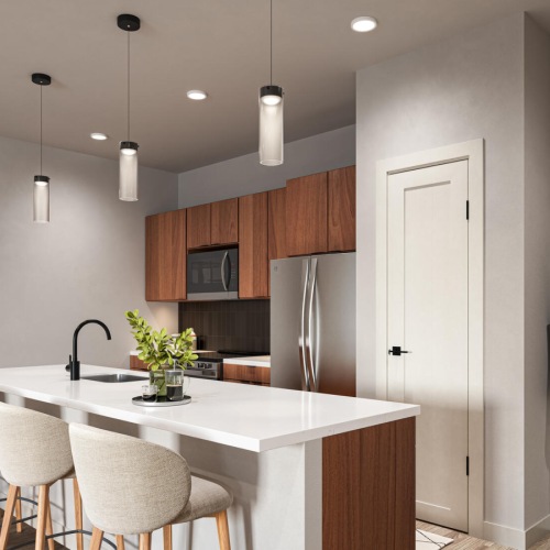 a kitchen with white cabinets