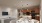 a large kitchen with a dining table